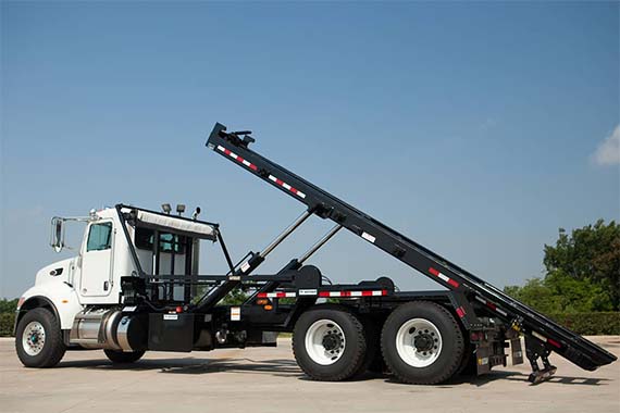 Roll-off truck with lift