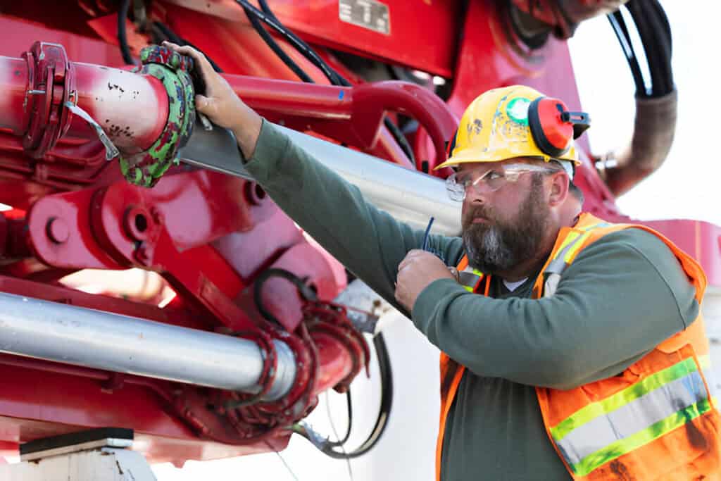 Man inspecting pipe - Armor Equipment